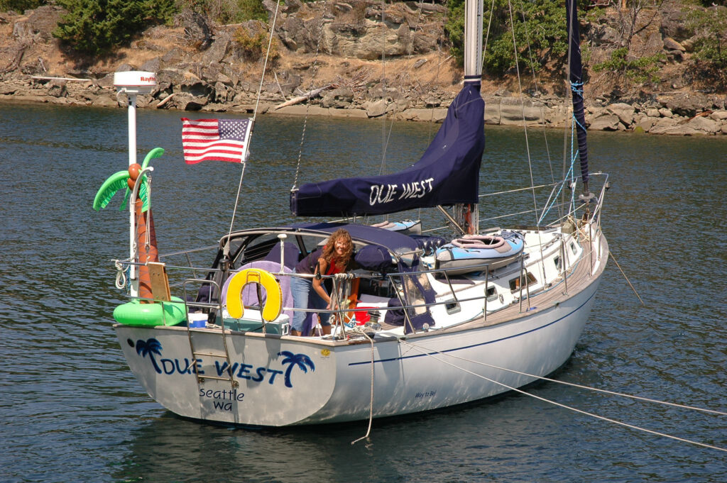 Heidi Hackler, CHHC, aboard her sailboat